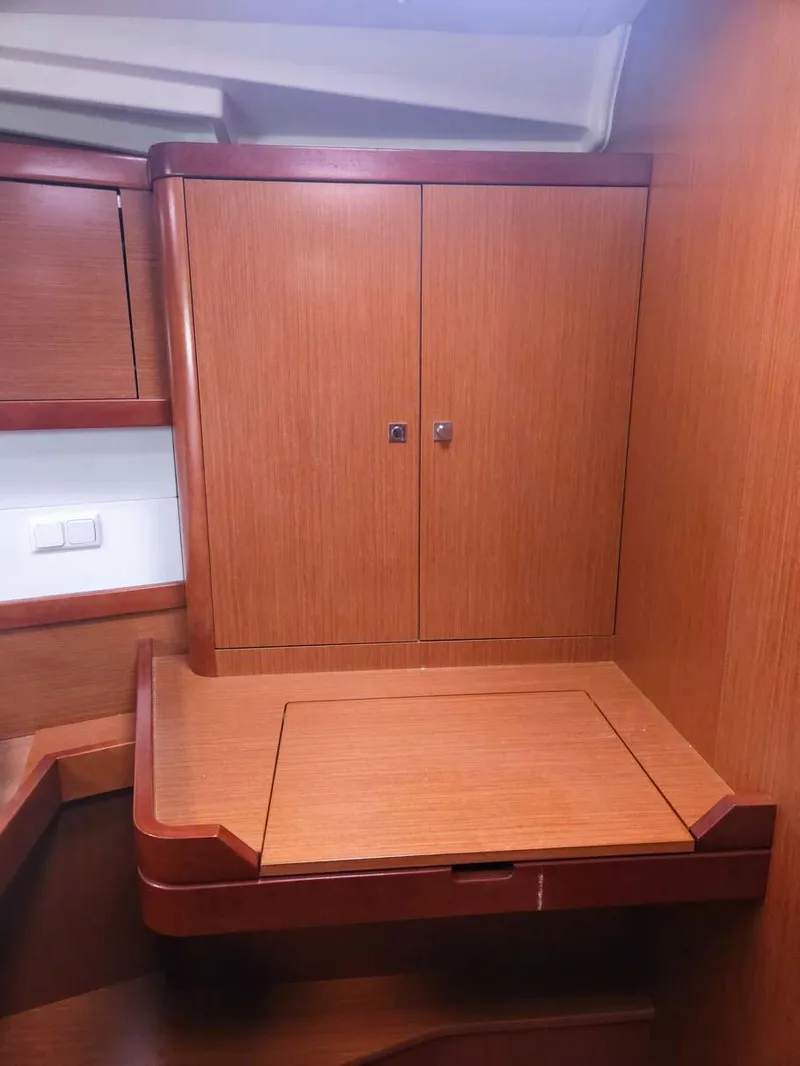 Slide: The Image of Interior of 2012 Beneteau Oceanis 41 yacht with wooden cabinetry. - 15