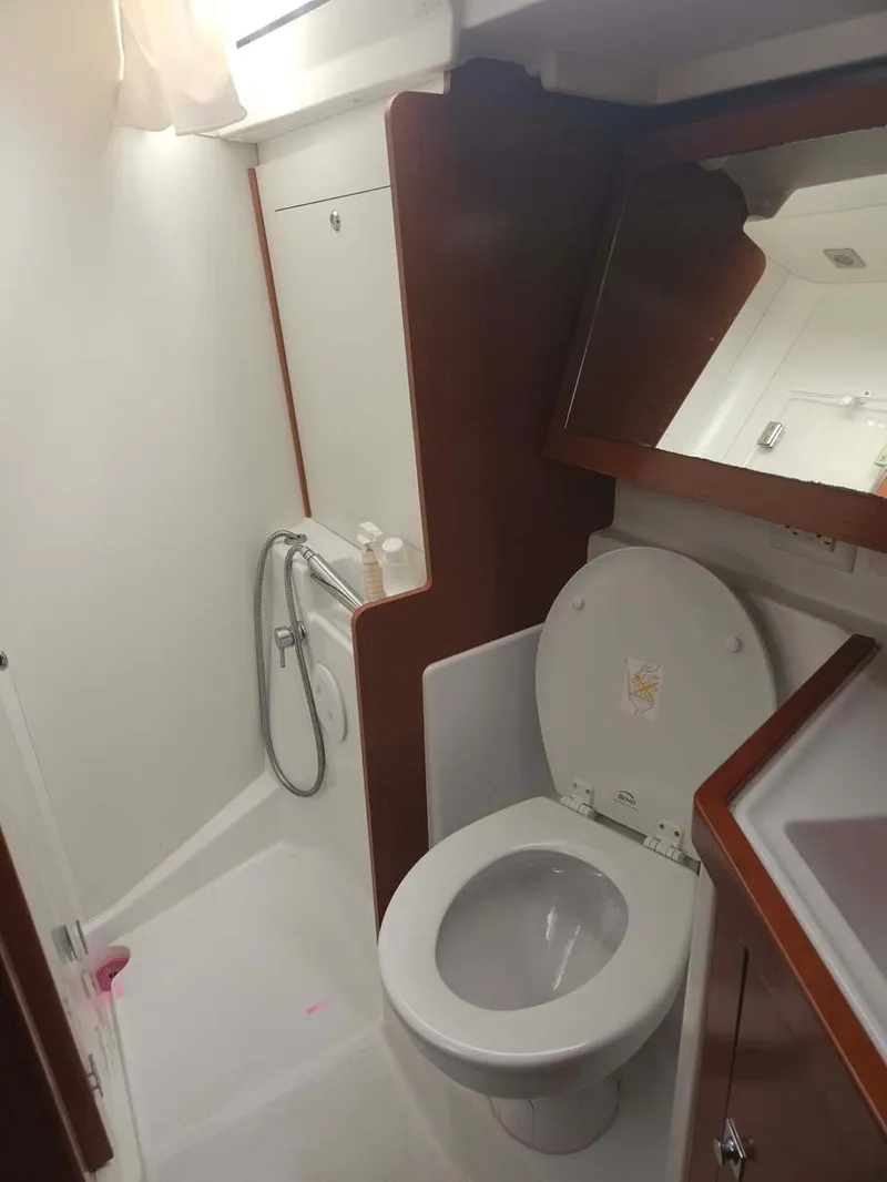 Slide: The Image of 2012 Beneteau Oceanis 41 yacht bathroom with shower and toilet. - 25