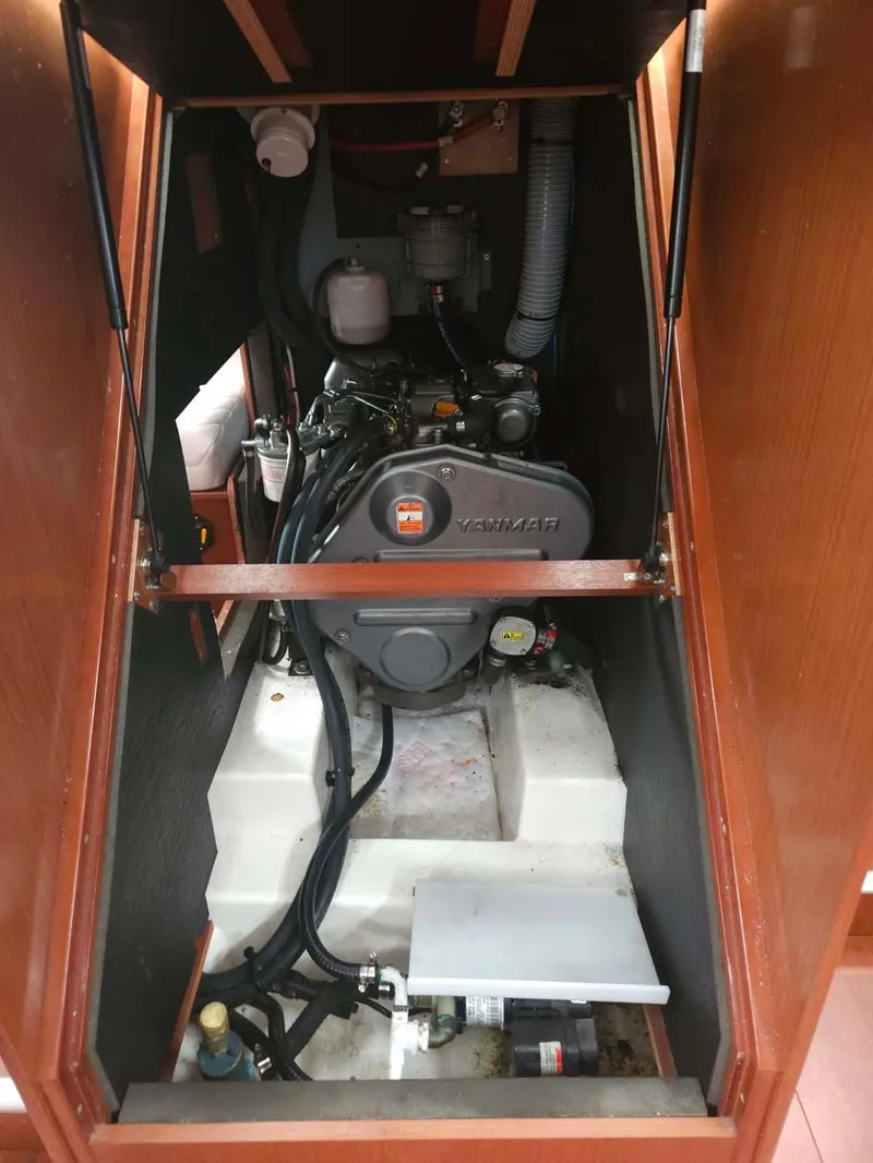 Slide: The Image of Engine compartment of 2012 Beneteau Oceanis 41 sailboat, showcasing Yanmar engine. - 31