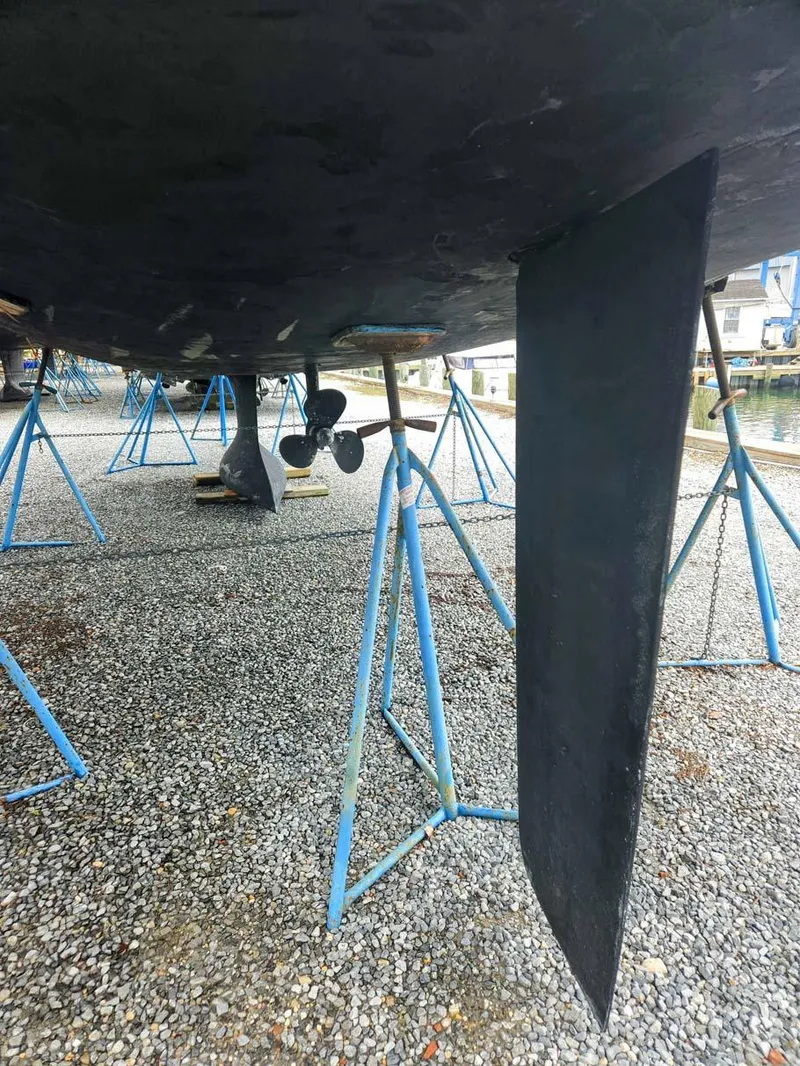 Slide: The Image of Beneteau Oceanis 41 sailboat keel and propeller on stands, 2012 model. - 33