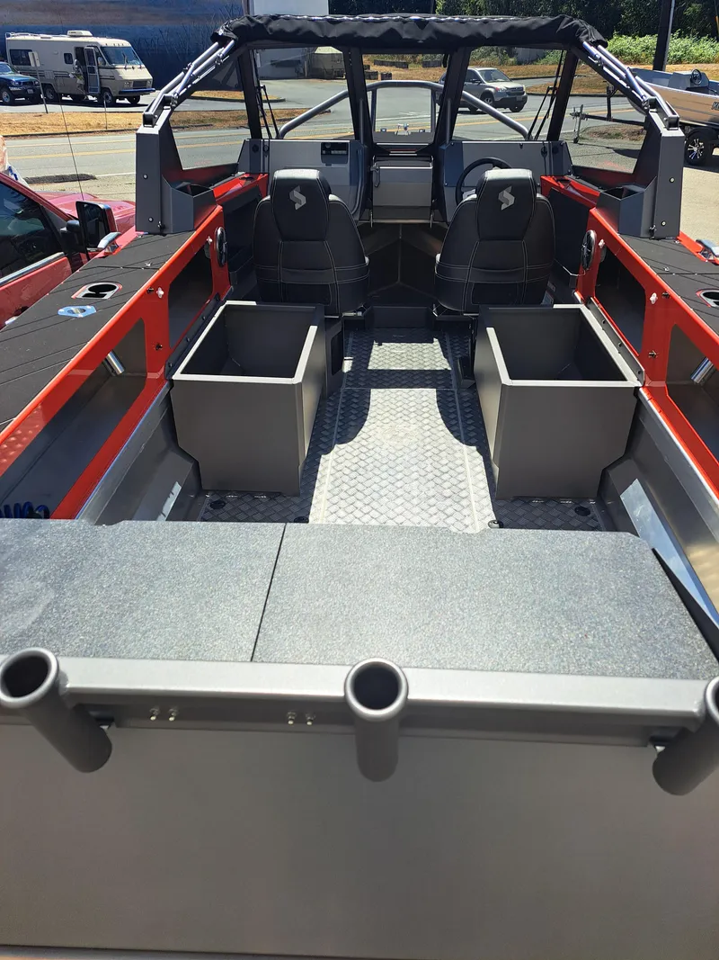 Slide: The Image of 2024 Stabicraft Treker Profish boat interior with seating and storage compartments. - 4