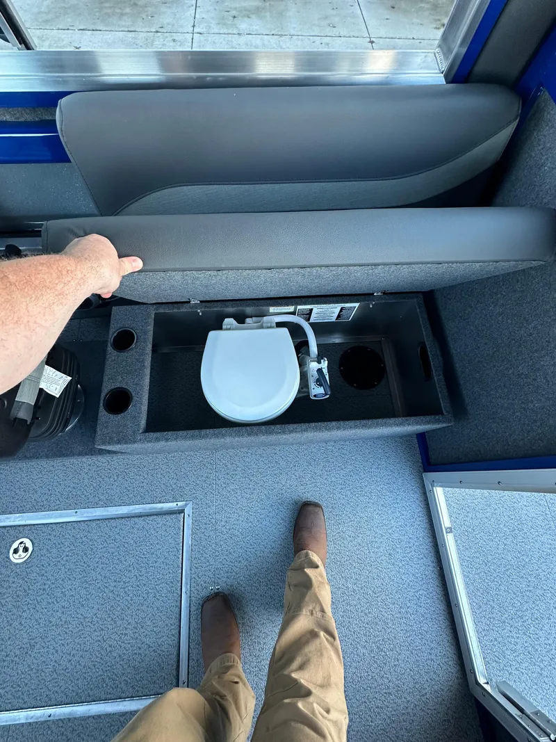 Slide: The Image of 2025 Spartan 240 Maximus Pro interior with hidden toilet compartment. - 13