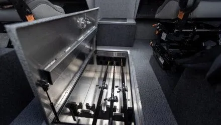 Slide: The Image of 2025 Spartan 240 Maximus Pro interior with open storage compartment. - 20