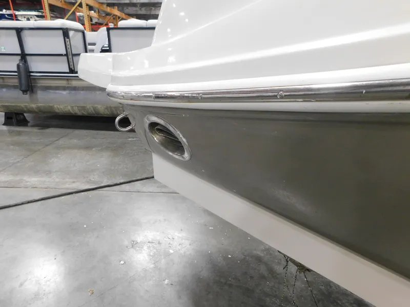 Slide: The Image of 2007 Sea Ray 260 Sundeck boat detail in indoor storage facility. - 3