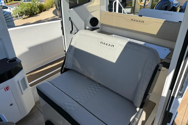 Slide: The Image of 2025 Navan C30 boat interior with branded seating and modern design. - 10