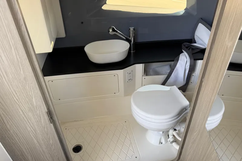 Slide: The Image of Modern bathroom in 2025 Navan C30 boat with sleek fixtures and compact design. - 16