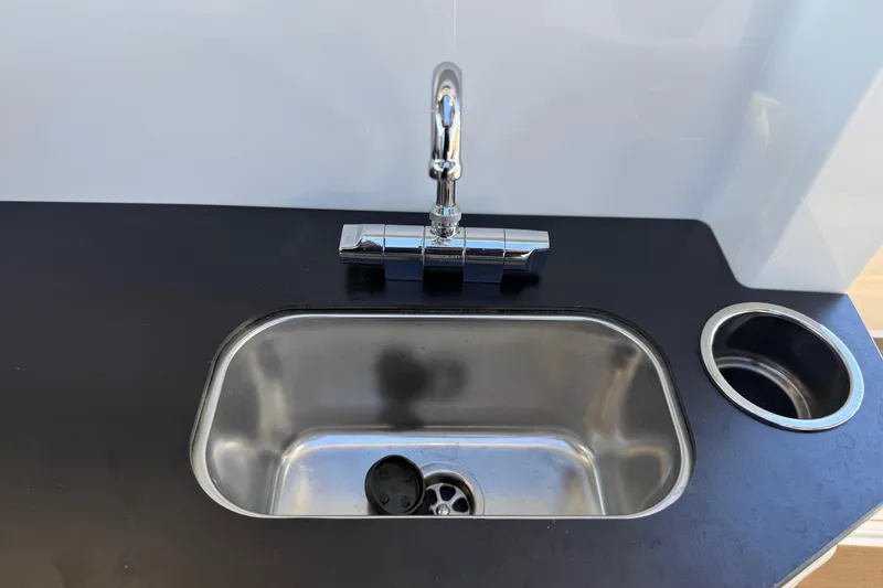 Slide: The Image of Stainless steel sink with modern faucet in Navan C30, 2025 model. - 20