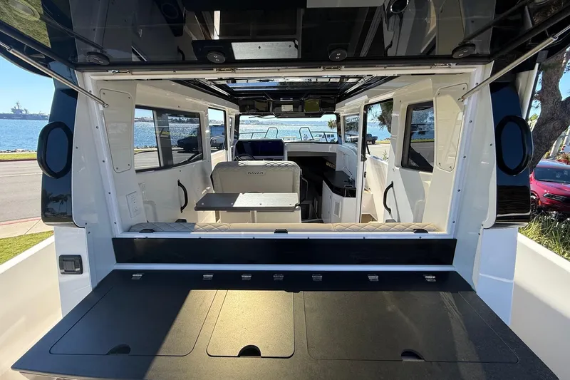 Slide: The Image of Interior view of 2025 Navan C30 boat, featuring spacious seating and modern design. - 7