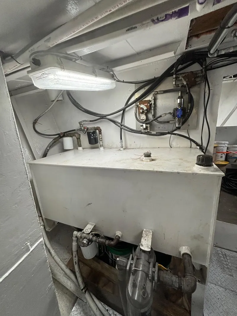 Slide: The Image of Engine room of 1978 Commercial LL Ice Trawler with machinery and wiring. - 14
