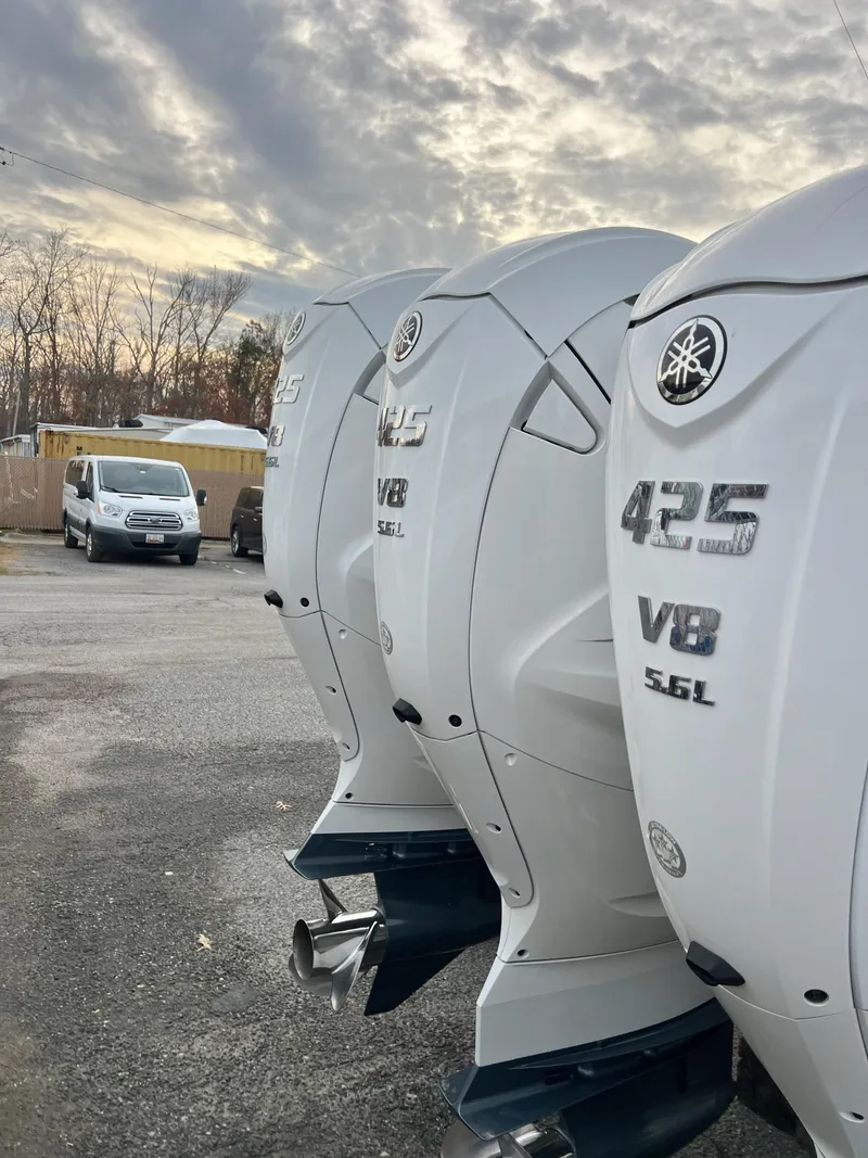 Slide: The Image of Grady-White Canyon 376 2022 with Yamaha 425 V8 engines in a parking lot. - 11