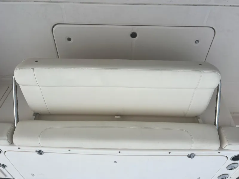 Slide: The Image of Grady-White Canyon 376 2022 boat seat, white leather upholstery, sleek design. - 16