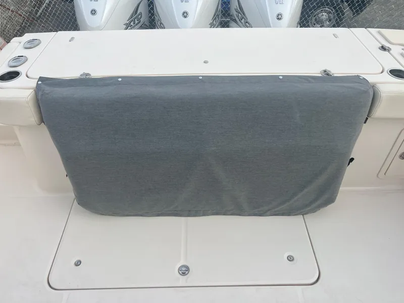 Slide: The Image of 2022 Grady-White Canyon 376 boat with covered seating area. - 17