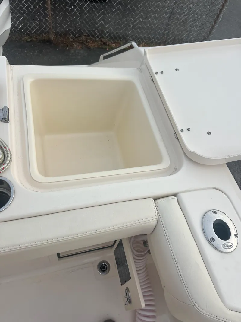 Slide: The Image of 2022 Grady-White Canyon 376 boat interior with storage compartment. - 21