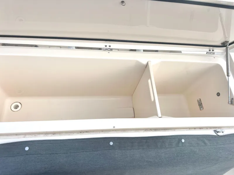 Slide: The Image of Open storage compartment on 2022 Grady-White Canyon 376 boat. - 22