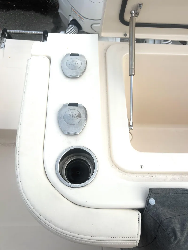 Slide: The Image of 2022 Grady-White Canyon 376 boat deck with storage compartment and cup holder. - 23