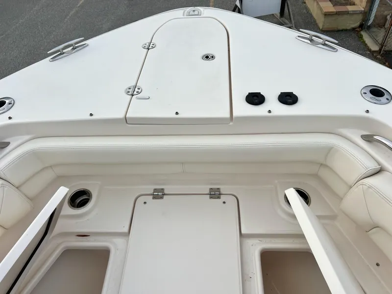 Slide: The Image of 2022 Grady-White Canyon 376 boat interior with seating and storage compartments. - 36