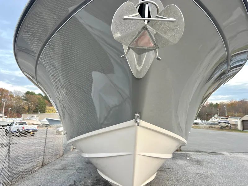 Slide: The Image of 2022 Grady-White Canyon 376 boat, front view with anchor, parked outdoors. - 4