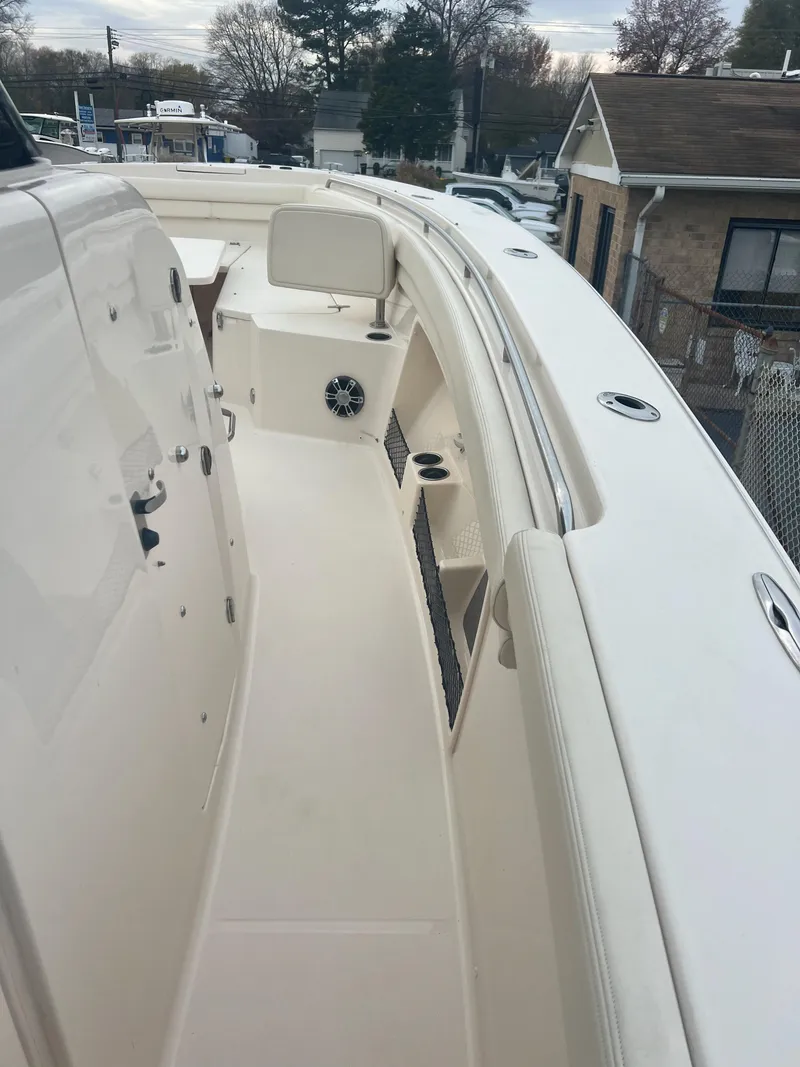 Slide: The Image of 2022 Grady-White Canyon 376 boat deck, sleek design, spacious layout, modern features. - 49