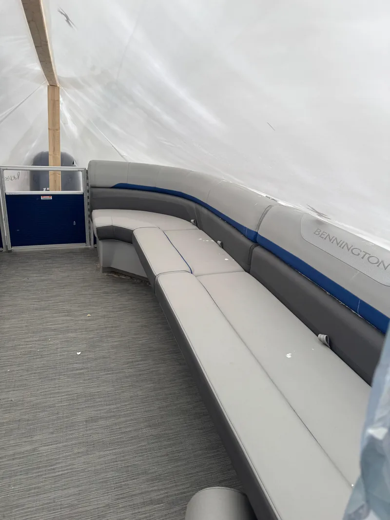 Slide: The Image of Dashboard of a 2022 Bennington 23XSSB with Simrad display and controls. - 5