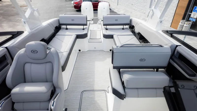 Slide: The Image of 2025 Cobalt R8 Outboard boat interior with luxurious gray seating and spacious layout. - 12