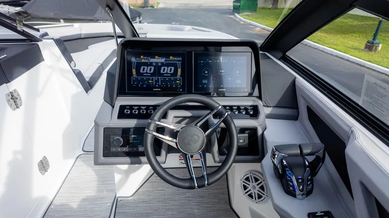 Slide: The Image of 2025 Cobalt R8 Outboard dashboard with modern controls and digital displays. - 25