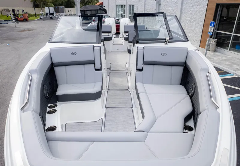 Slide: The Image of 2025 Cobalt R8 Outboard boat with spacious gray interior seating. - 3