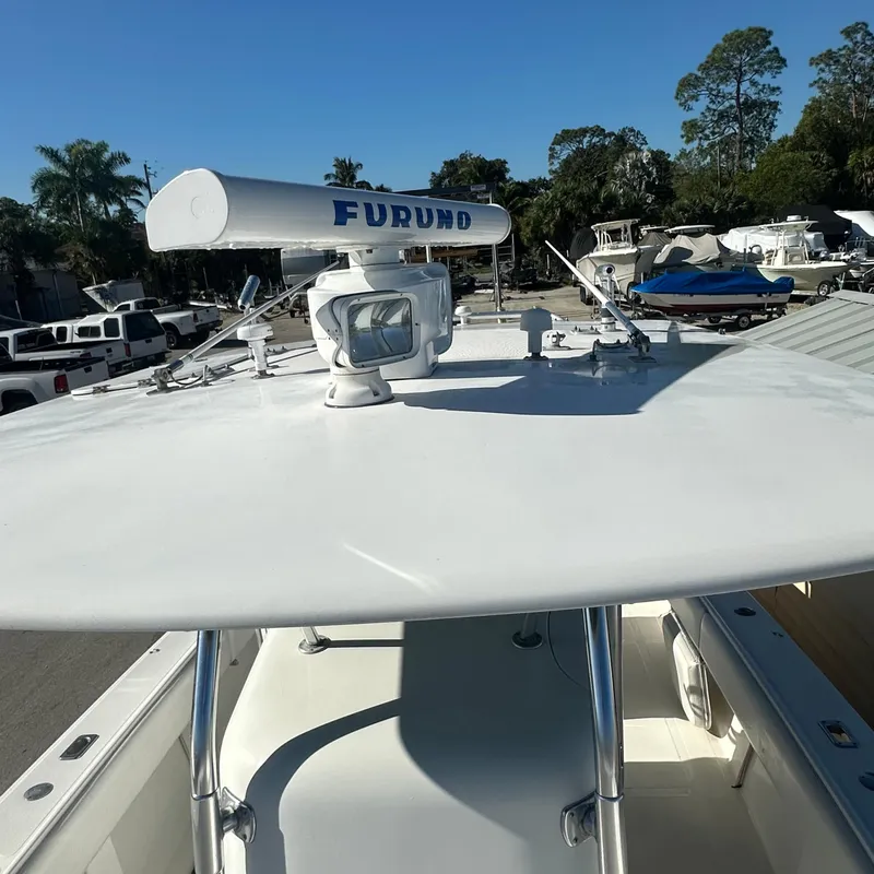 Slide: The Image of 2004 Venture Open Fisherman boat with Furuno radar on top. - 5