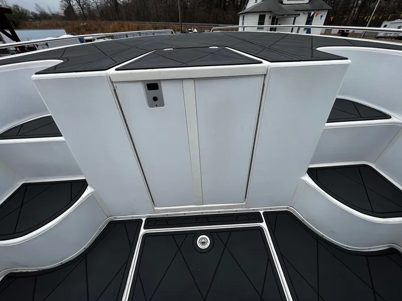 Slide: The Image of 2011 Fountain 38 CC Tournament Edition boat deck with black and white design. - 7