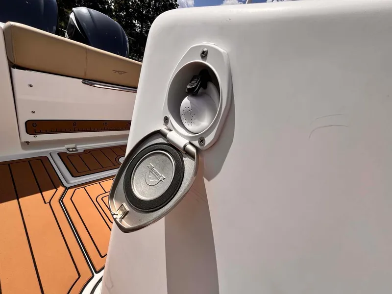 Slide: The Image of Fuel cap of 2015 Tidewater 280 CC Adventure boat with teak flooring. - 18