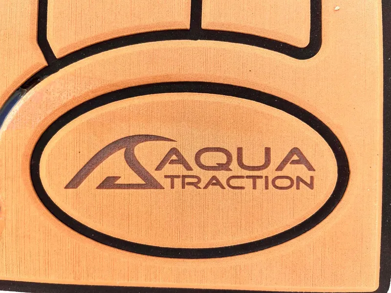 Slide: The Image of AquaTraction logo on Tidewater 280 CC Adventure boat, 2015 model. - 19