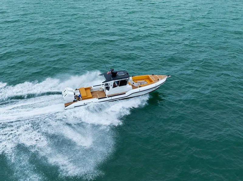 Slide: The Image of 2022 Rafnar Targa 40 boat cruising on open water. - 10