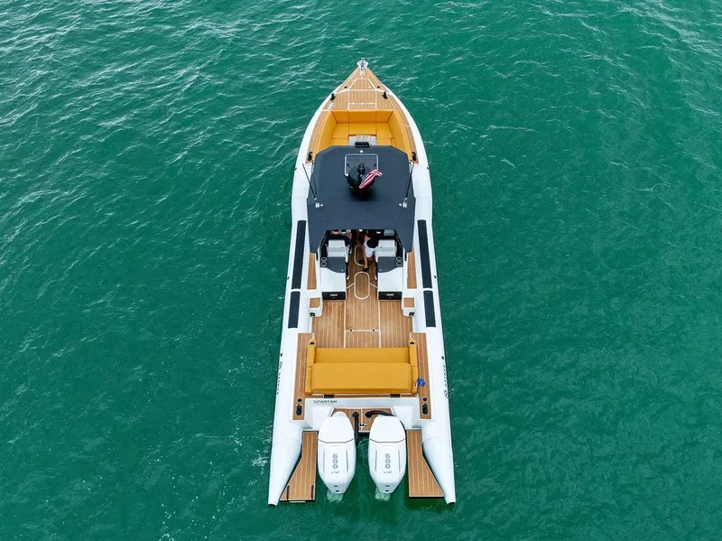 Slide: The Image of Aerial view of 2022 Rafnar Targa 40 boat on turquoise water. - 13