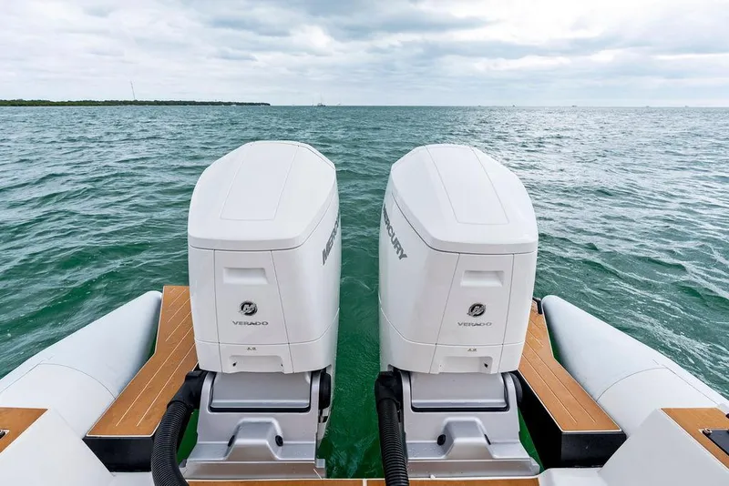 Slide: The Image of Rafnar Targa 40 boat with twin outboard engines on open water, 2022 model. - 14