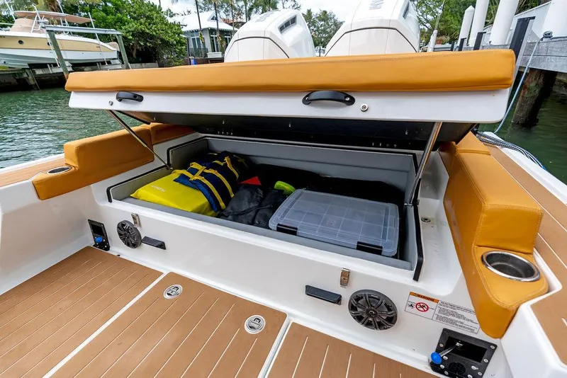 Slide: The Image of Rafnar Targa 40 boat storage compartment with life jackets and gear, 2022 model. - 17