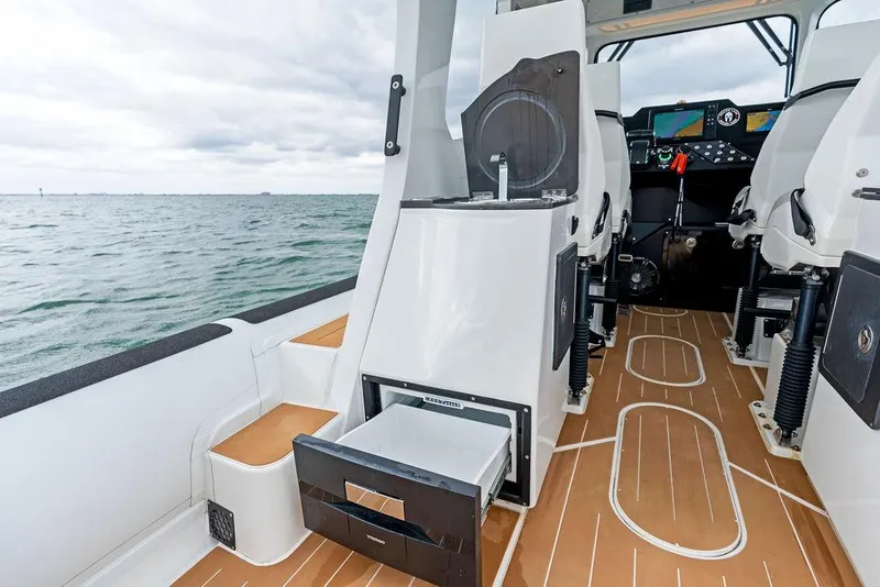 Slide: The Image of Rafnar Targa 40 interior, 2022 model, featuring sleek design and modern amenities on open water. - 19