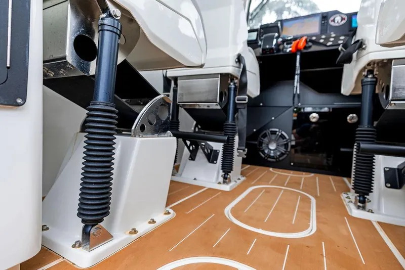 Slide: The Image of Interior view of 2022 Rafnar Targa 40 boat cockpit with modern seating and controls. - 22