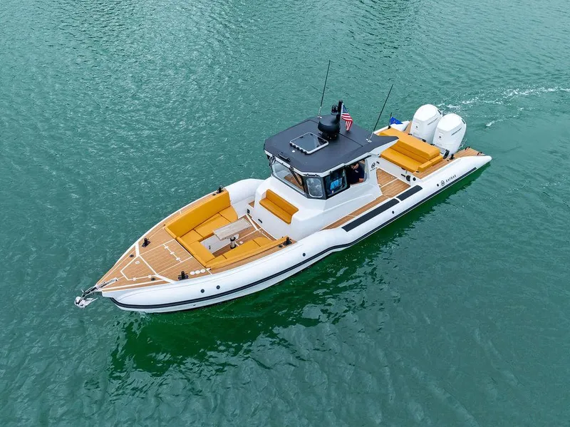 Slide: The Image of Rafnar Targa 40 boat, 2022 model, cruising on clear water with sleek design and modern features. - 4