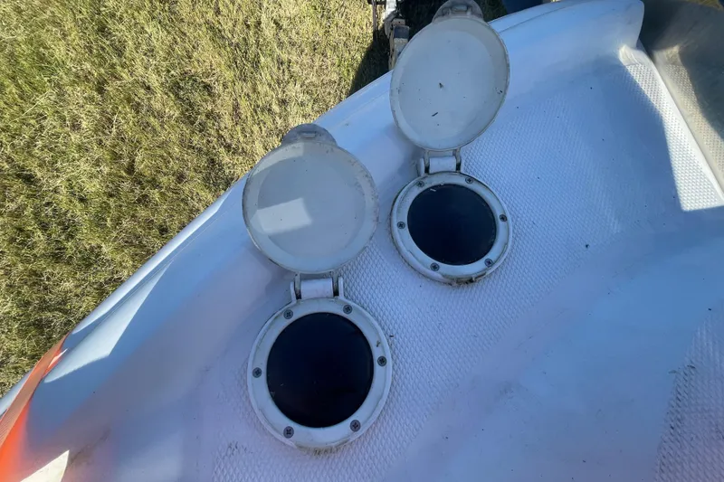 Slide: The Image of Open hatches on 2006 Sea Ray 320 Sundancer boat deck. - 15