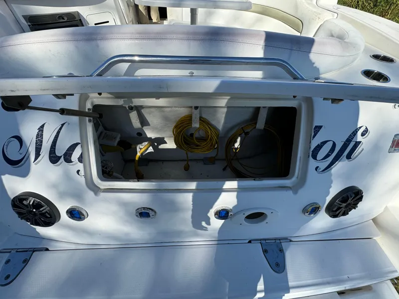 Slide: The Image of Open storage compartment on 2006 Sea Ray 320 Sundancer boat. - 26