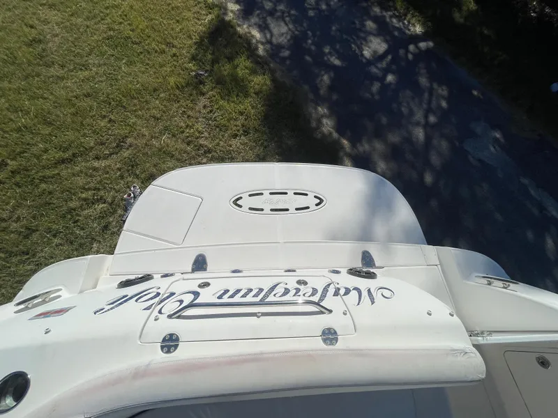 Slide: The Image of Aerial view of 2006 Sea Ray 320 Sundancer boat on grass. - 30