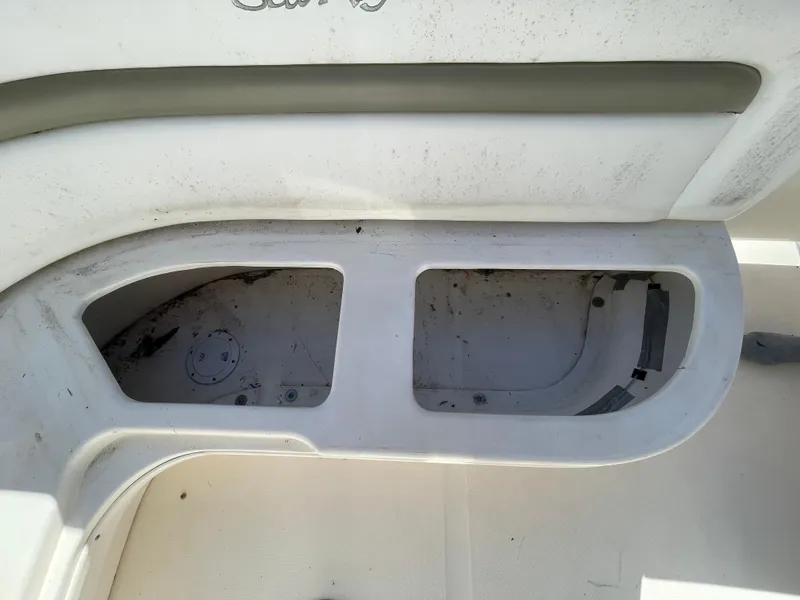 Slide: The Image of Storage compartment on a 2006 Sea Ray 320 Sundancer boat. - 34