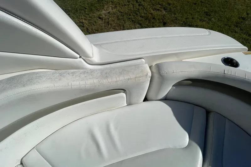 Slide: The Image of White leather seating on 2006 Sea Ray 320 Sundancer boat. - 36
