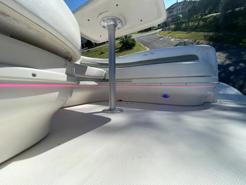 Slide: The Image of 2006 Sea Ray 320 Sundancer boat interior with seating and table. - 41