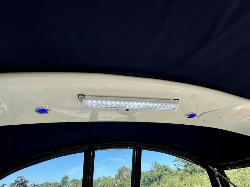 Slide: The Image of Interior view of 2006 Sea Ray 320 Sundancer with LED lighting and blue accents. - 49