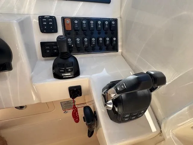 Slide: The Image of 2018 Grady-White Freedom 325 boat controls and dashboard with Yamaha joystick and throttle. - 27