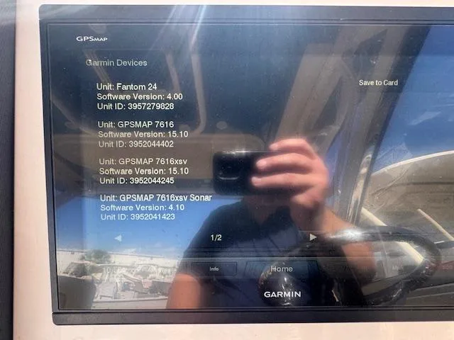 Slide: The Image of Garmin GPS display on 2018 Grady-White Freedom 325 boat showing device software versions. - 34