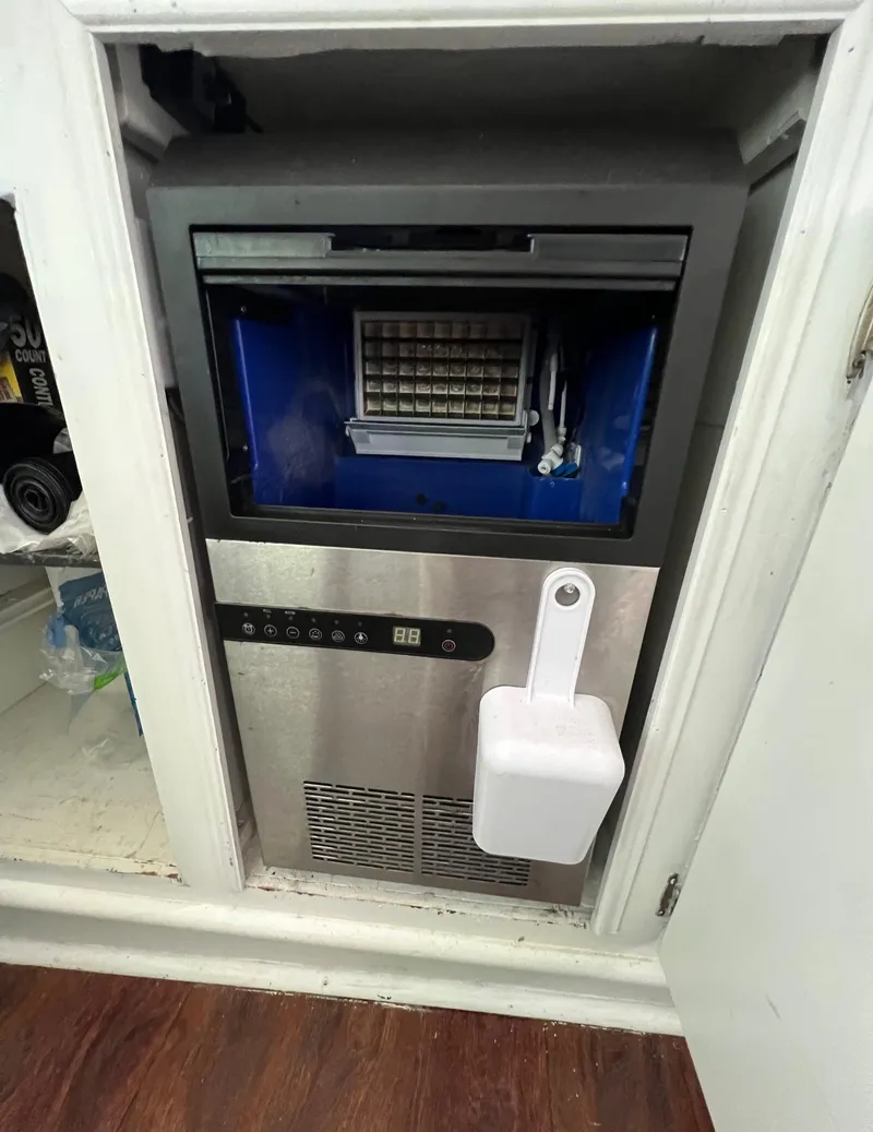 Slide: The Image of Ice maker on 1975 Hatteras 58 Motor Yacht, installed in a cabinet. - 10