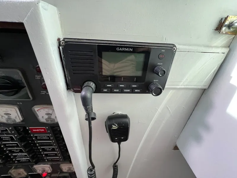 Slide: The Image of Garmin radio system on 1975 Hatteras 58 Motor Yacht dashboard. - 14