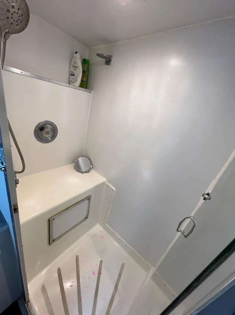 Slide: The Image of Shower area in 1975 Hatteras 58 Motor Yacht with white interior. - 29