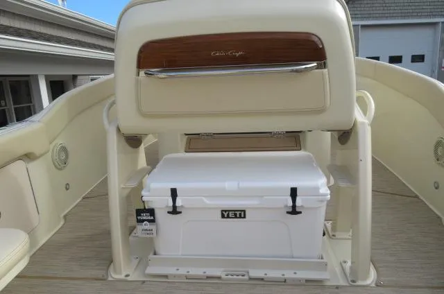 Slide: The Image of Chris-Craft Catalina 28 (2025) boat interior with Yeti cooler storage. - 18